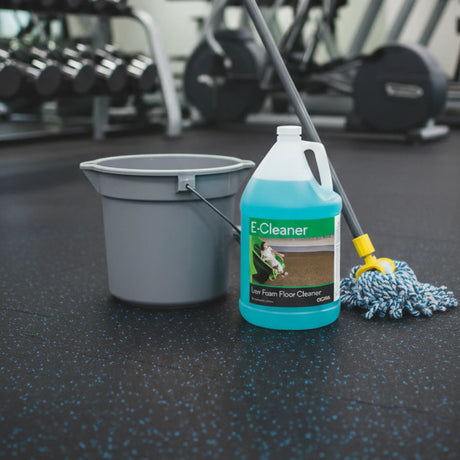 E-Cleaner floor cleaning solution with bucket and mop on a gym floor.