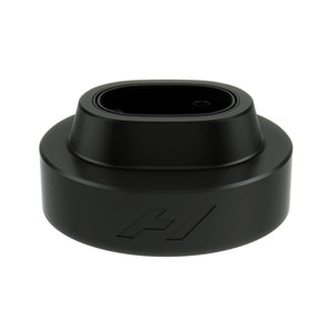 Percussion massage gun charging stand by Hyperice