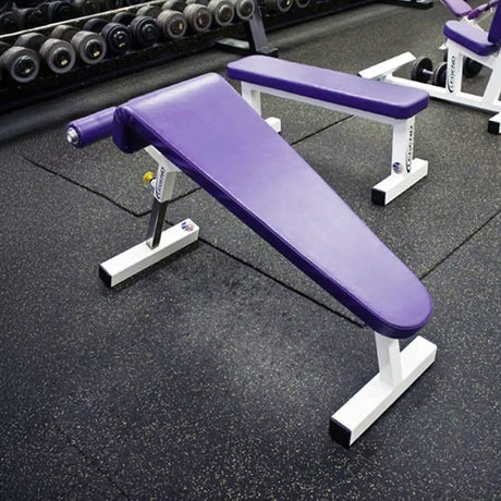 Purple and white adjustable weight bench in a gym setting