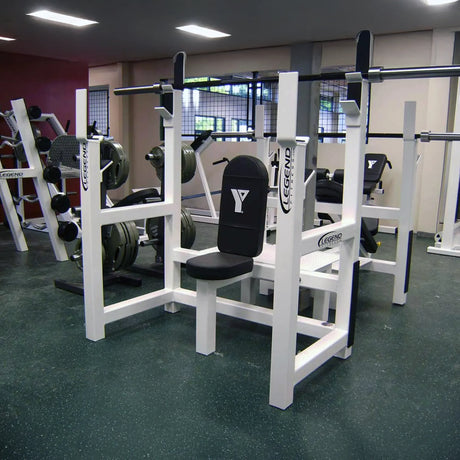 Gym equipment with Legend Fitness branding in a fitness center.