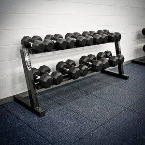 Set of dumbbells on a rack in a gym setting