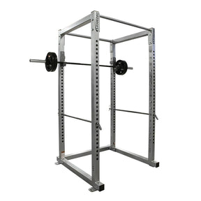 Gray power rack with barbell on a white background