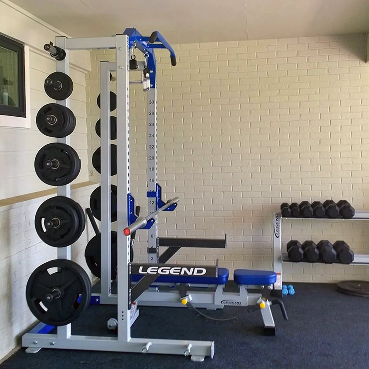 Gym equipment with Legend branding in a home gym setting.