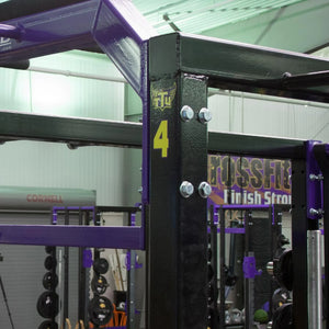Gym equipment with a number '4' and 'TTU' branding in a fitness center.
