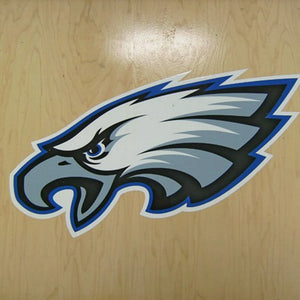 Eagle logo on a wooden surface