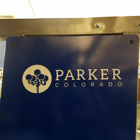 Parker Colorado logo on a blue background
