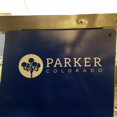 Parker Colorado logo on a blue background