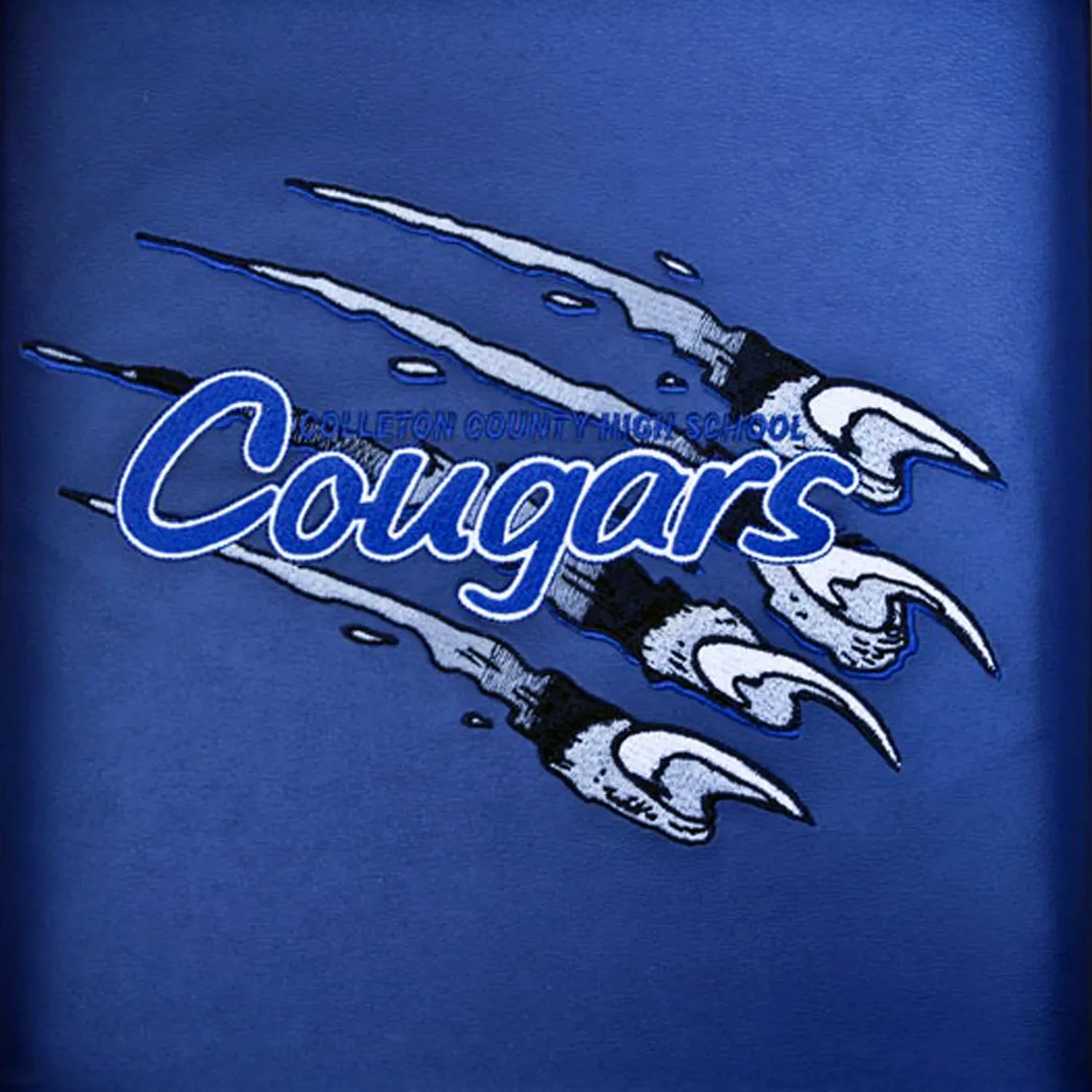 A blue bench pad with 'Cougars' embroidered on it