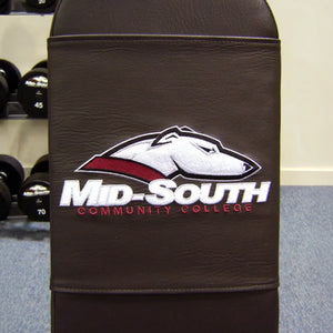 A black bench pad with a race hound and the words 
'Mid-South Community College' embroidered on it