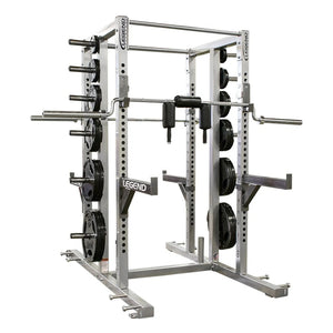 Gray power rack with weight plates on a white background