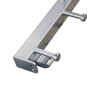 Metal bracket with two cylindrical components on a white background