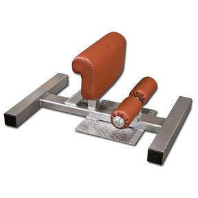 A silver Sissy Squat fitness machine with orange pads on a white background