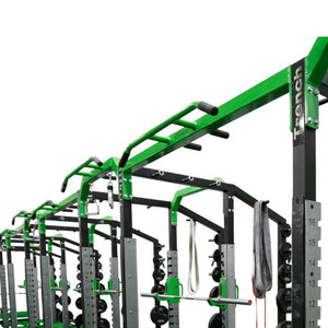 Green and black fitness equipment rack with 'Trench Fitness' branding on a white background
