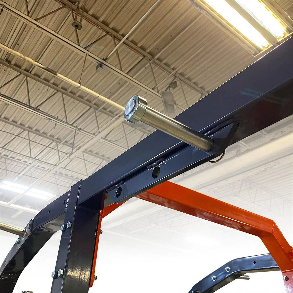 Metal frame structure with a bolt in an industrial setting