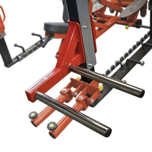 Close-up of a red and black piece of equipment with metal bars on a white background