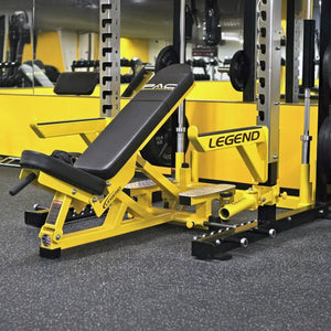 Yellow weight bench and squat rack with 'Legend' branding in a gym setting