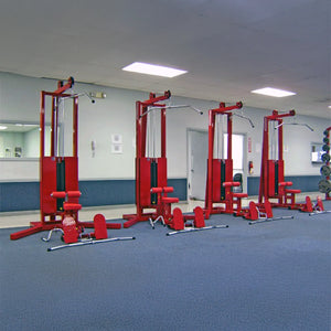 A row of lat pulldown floor row gym machine on a blue floor in a gym