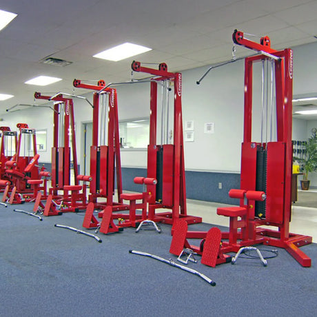 A row of lat pulldown floor row gym machines in a gym