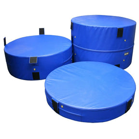 Three blue round plyometric cushions on a white background