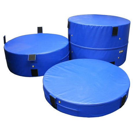 Three blue round plyometric cushions on a white background