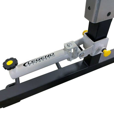 A metal landmine attachment mounted to a squat rack branded with a 'Legend Fitness' decal on a white background