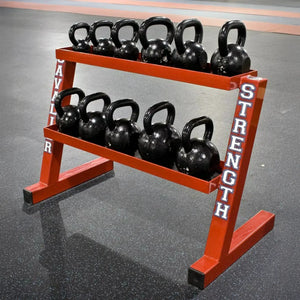 Kettlebell rack with black kettlebells on a gray floor