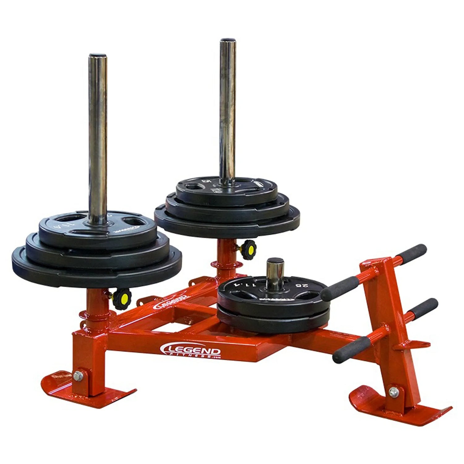 A red fitness sled with black weight plates on it on a white background