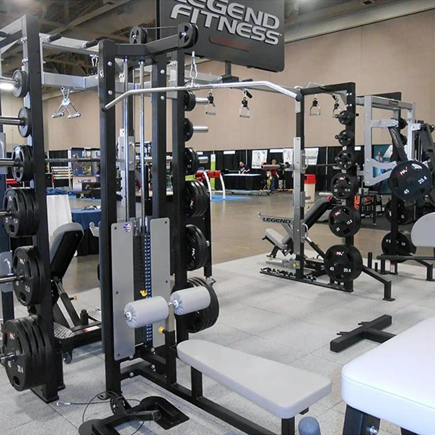 Gym equipment with Legend Fitness branding in a fitness center.