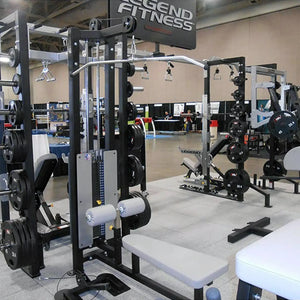 Gym equipment with Legend Fitness branding in a fitness center.