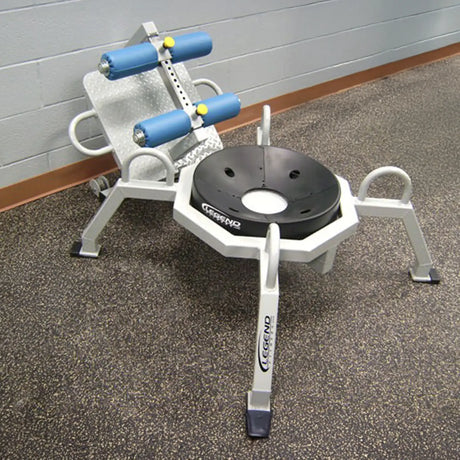 A piece of fitness equipment on a rubber gym floor