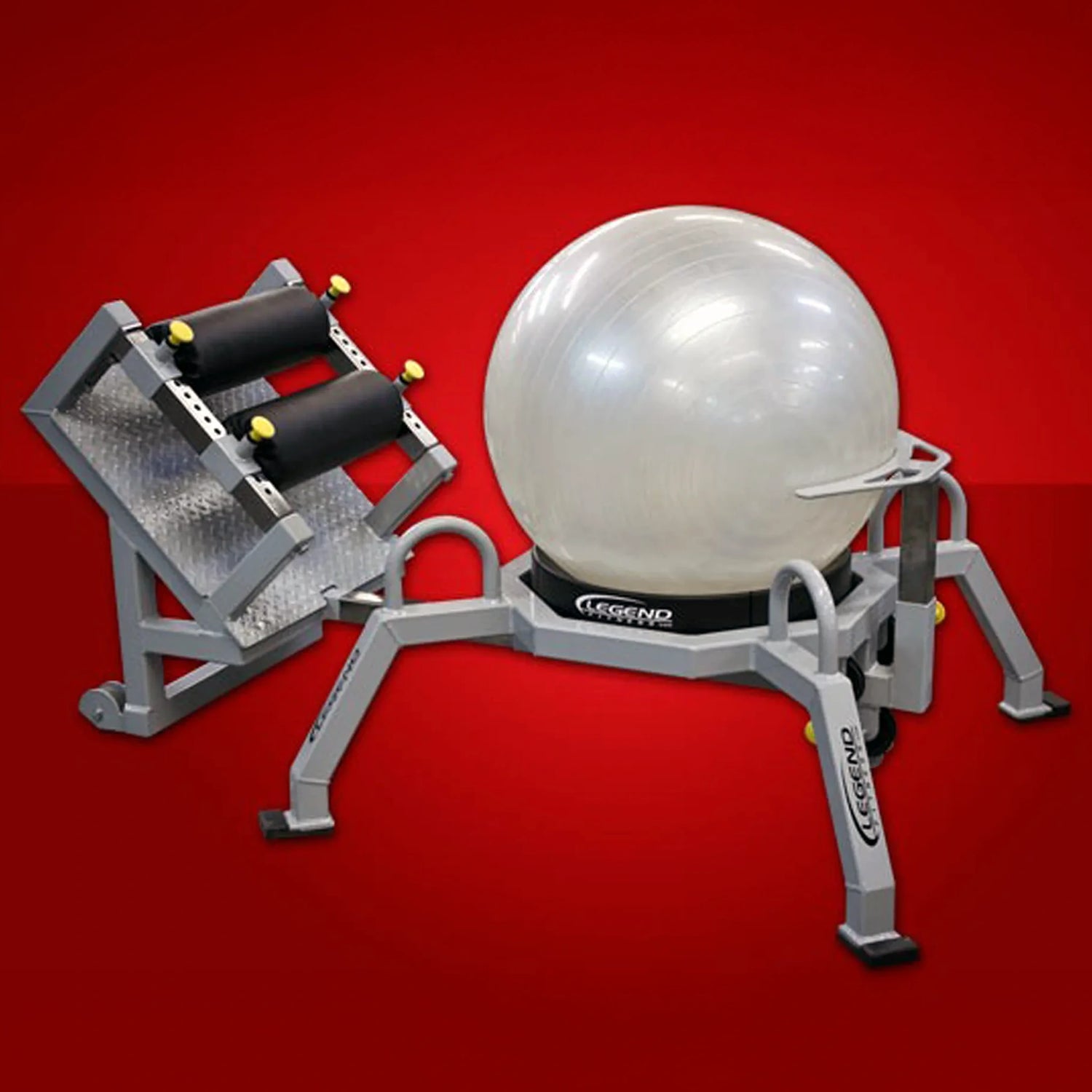A white fitness ball on a gray and black piece of fitness equipment on a red background
