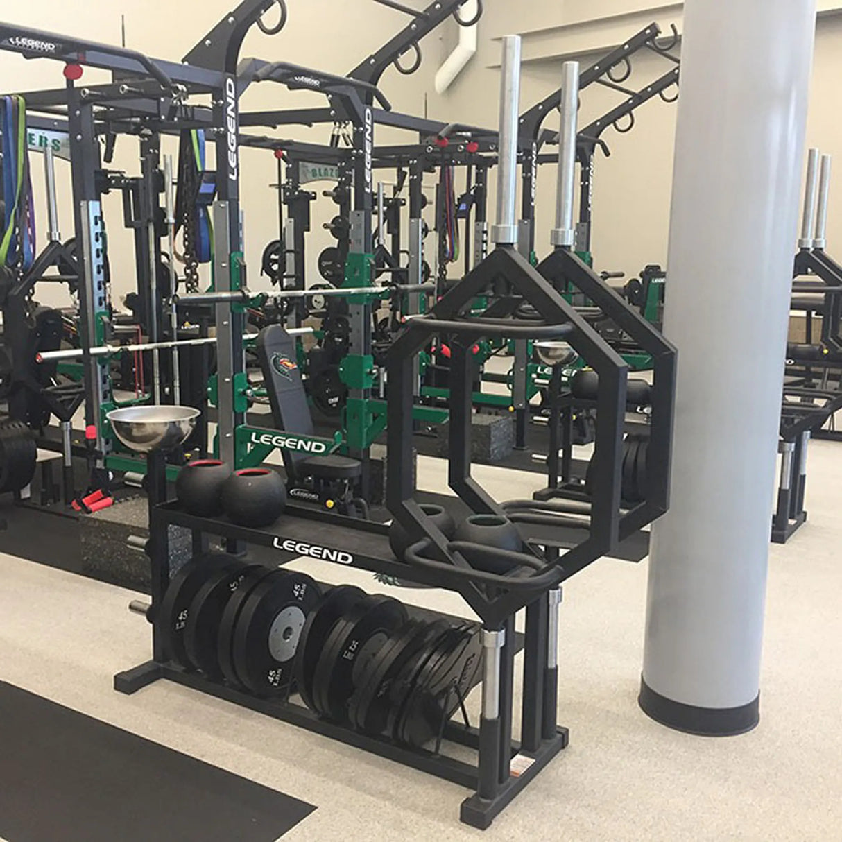 Black gym equipment in a weight room