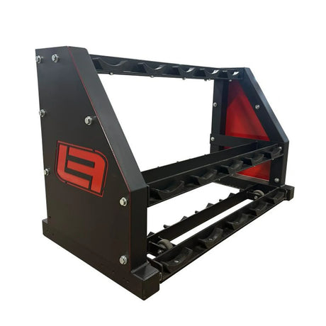 Black and red dumbbell storage rack with three shelves with saddles on a white background