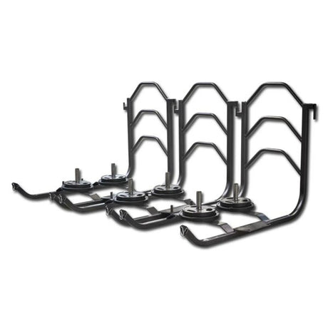 Three black metal push sleds with black weight plates on them on a white background