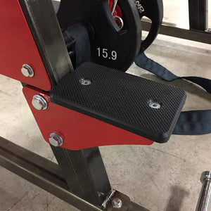 Black weight plate holder on a red and black weightlifting machine with a weight plate labeled '15.9'.
