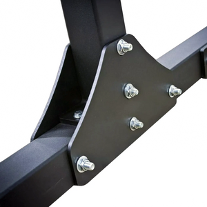 Close-up of a black metal bracket with screws on a white background
