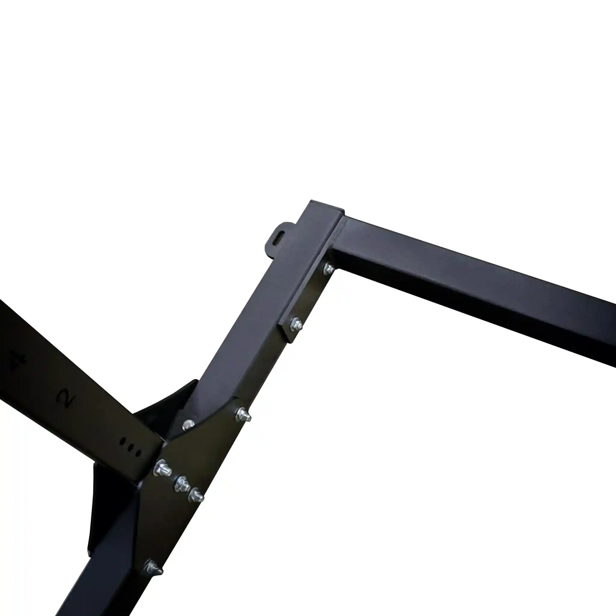 Close-up of a black metal frame with screws on a white background