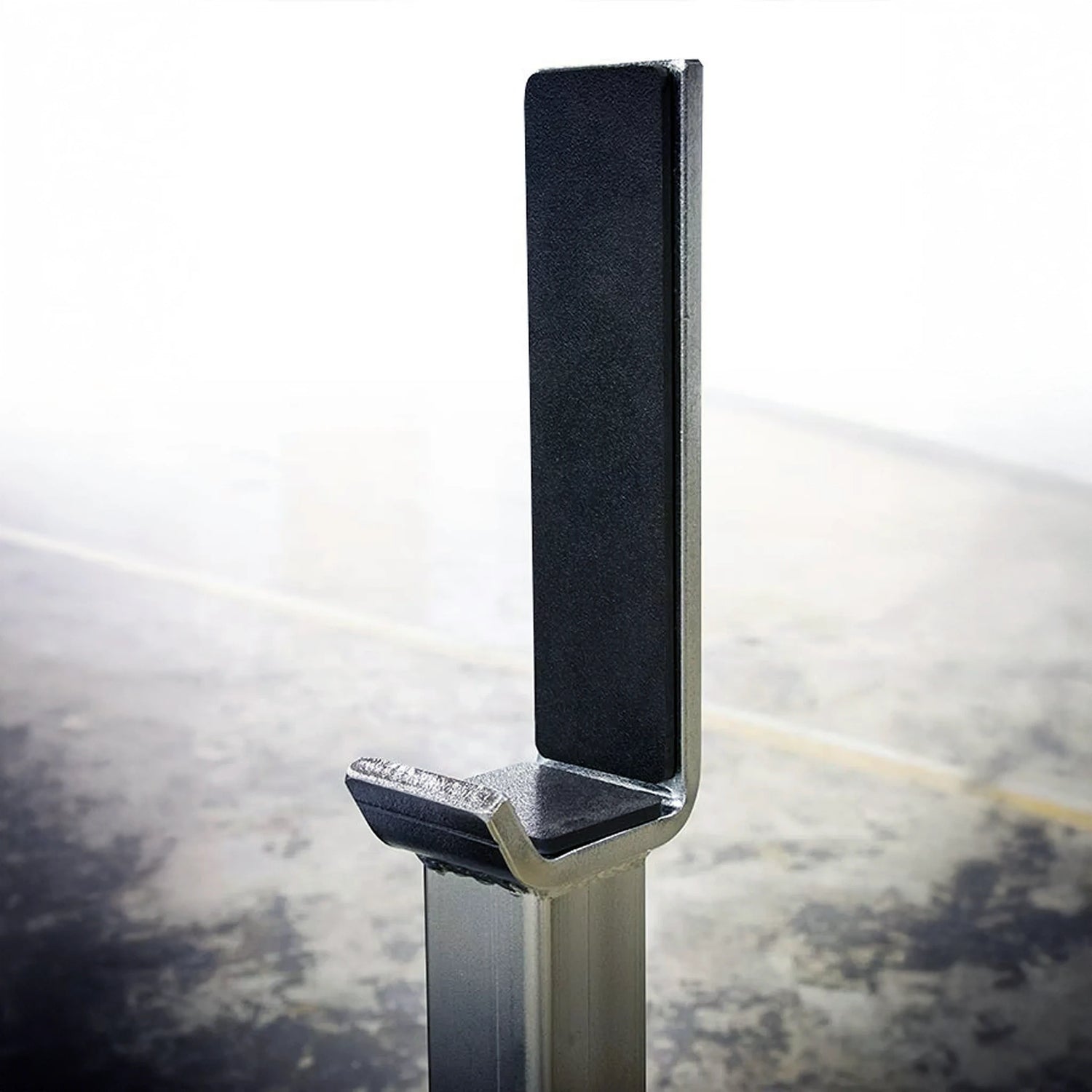 Silver and black barbell stand