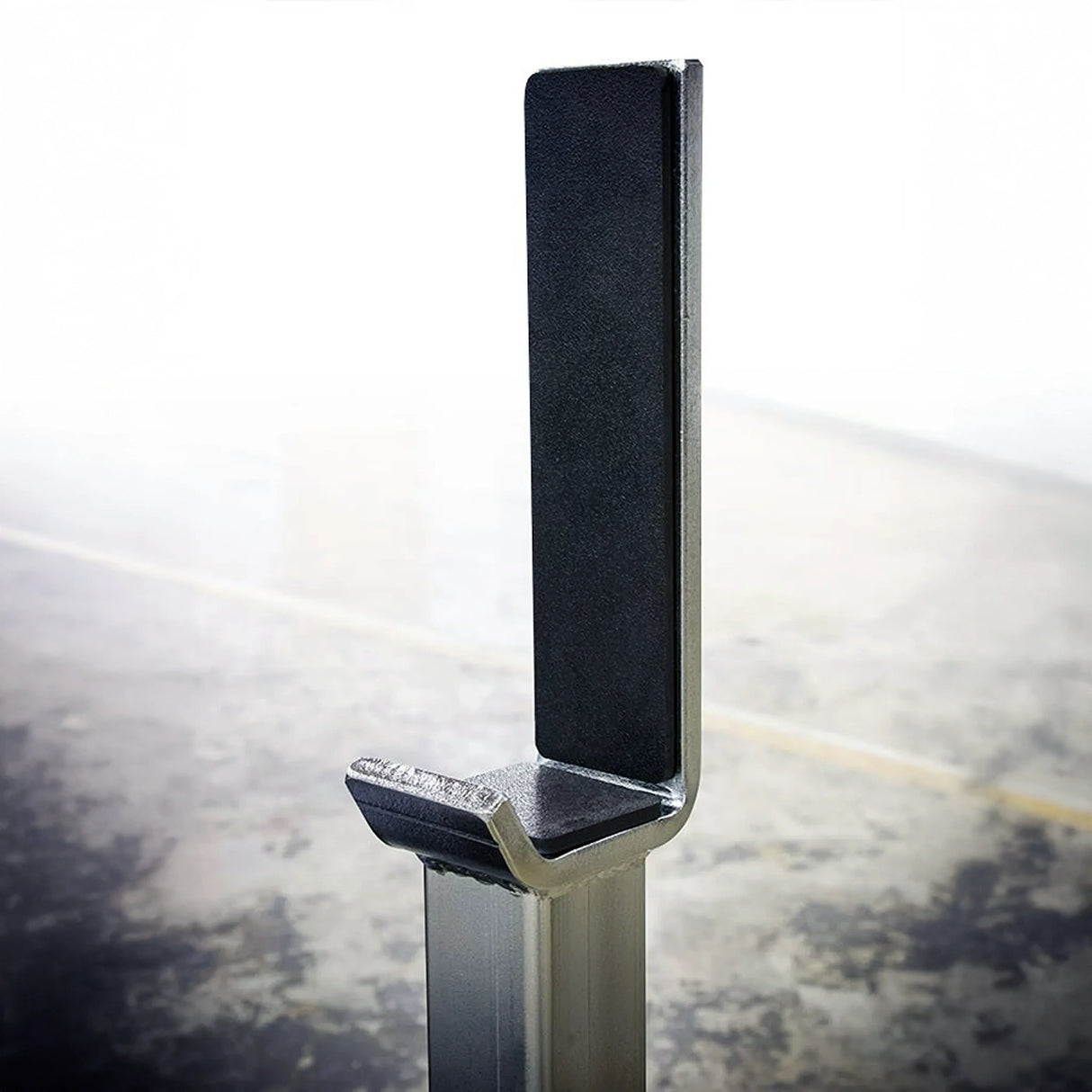 Silver and black barbell stand