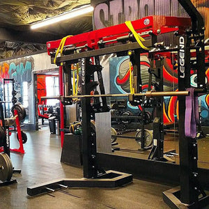 Gym equipment with Legend Fitness branding in a gym setting