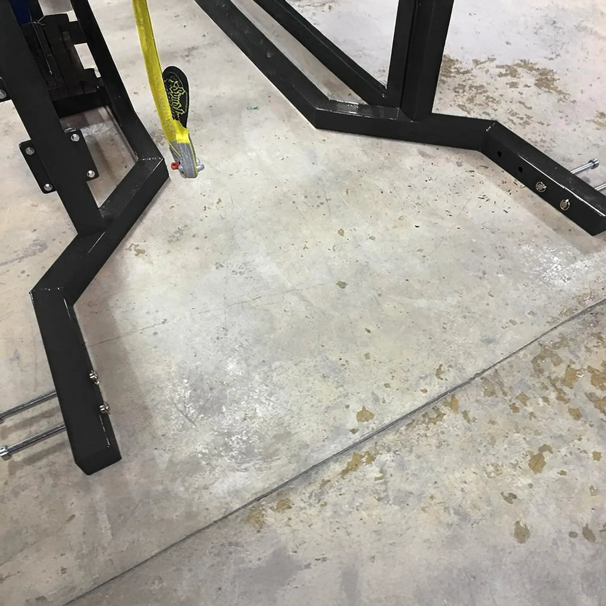 Black metal frame on a concrete floor