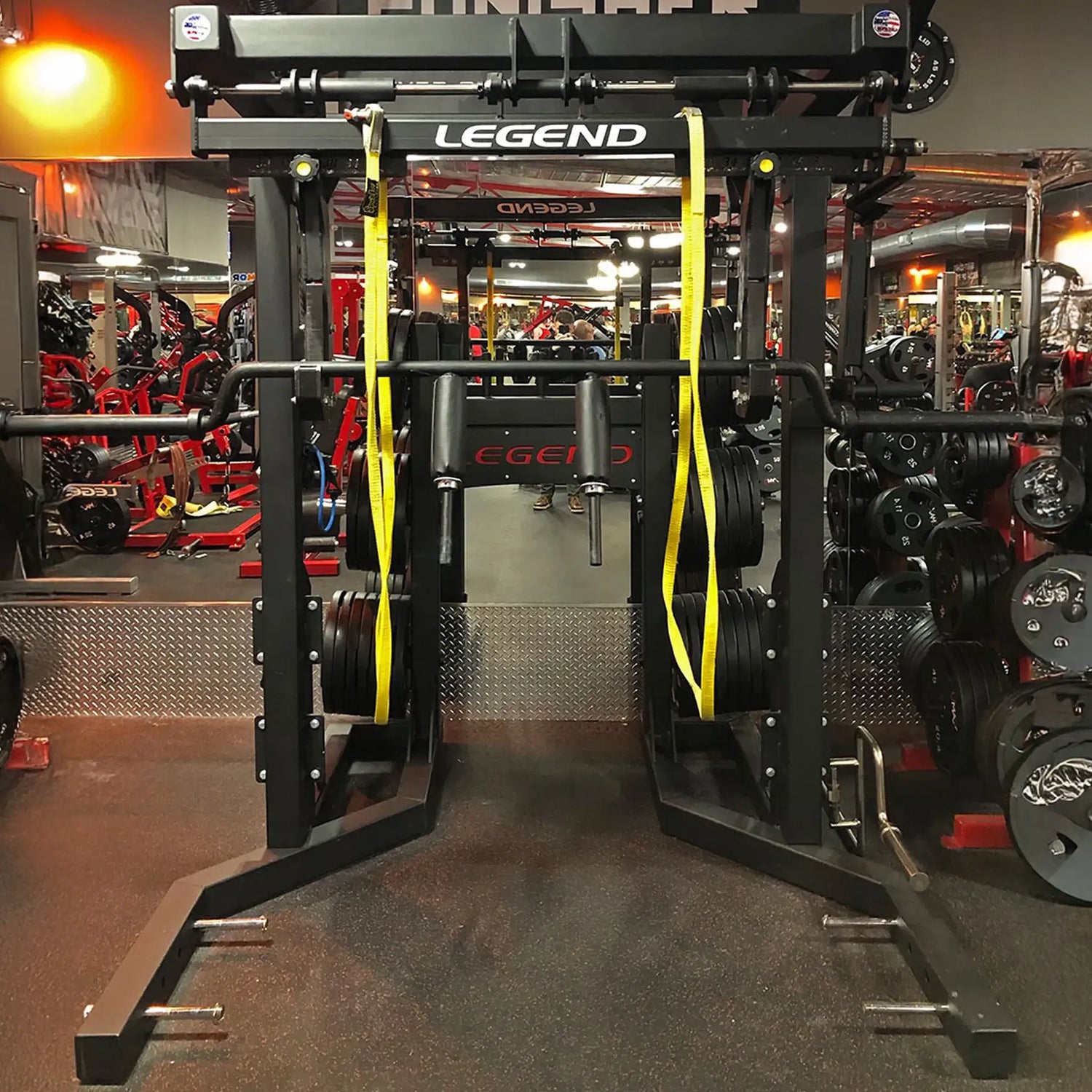 Gym equipment with 'Legend' branding in a fitness center setting