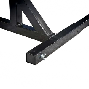 Close-up of a black metal frame with a wingnut bolt on a white background