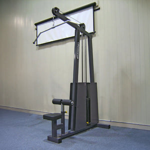 The Legend Fitness 905 Lat Pulldown Machine, featuring a padded seat and adjustable weights, is set against a light-colored gym wall with a white projection screen mounted above it.