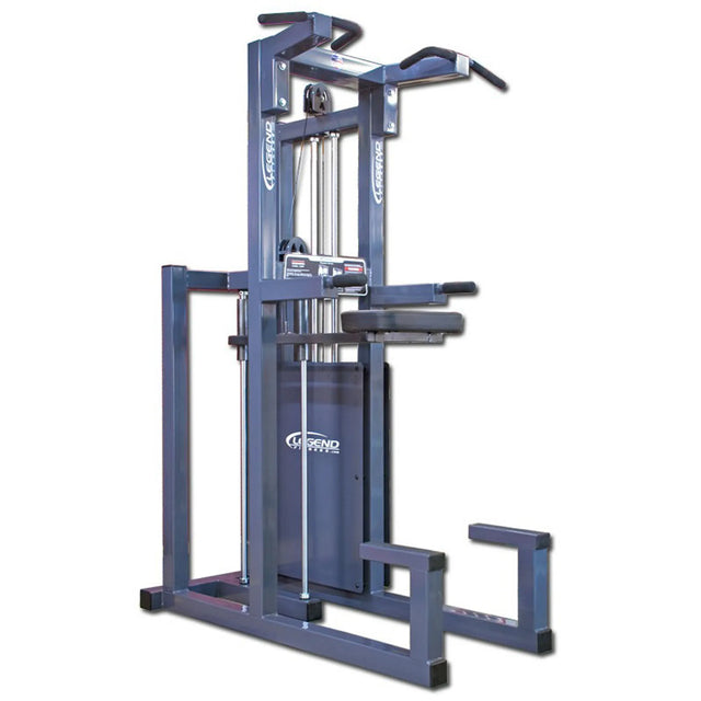 The Legend Fitness 933 Dip / Chin-Up Assist Combo Machine is a gray gym unit with padded armrests, step platforms, and multiple handles for strength training. The Legend Fitness brand is visible on the machine.