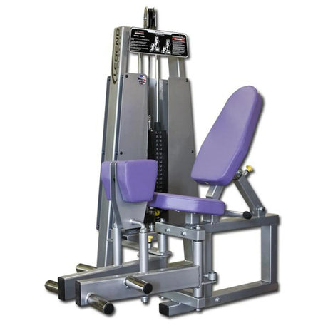 The Legend Fitness 949 Inner Thigh Machine by Legend Fitness is a seated gym machine with purple padding for hip abduction/adduction, featuring adjustable weights and instructional diagrams on the top panel.