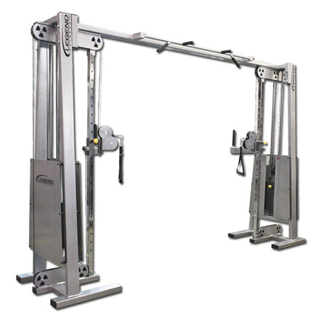 The Legend Fitness 954 Cable Crossover with Adjustable Pulleys features dual weight stacks, adjustable pulleys, handles, a pull-up bar on top, and a sleek metallic finish—ideal for versatile strength training.
