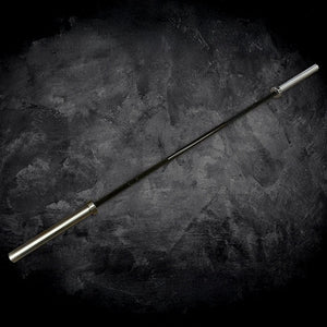 Barbell on a dark textured surface