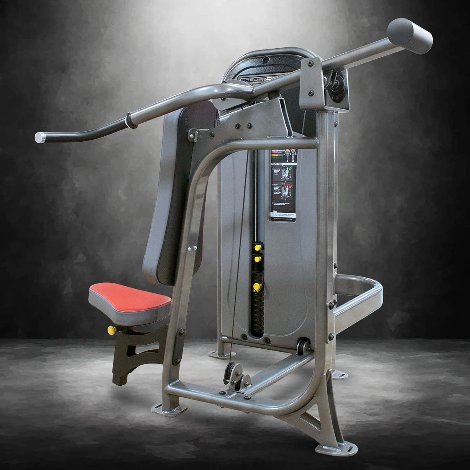 Gym machine with red seat on a dark background