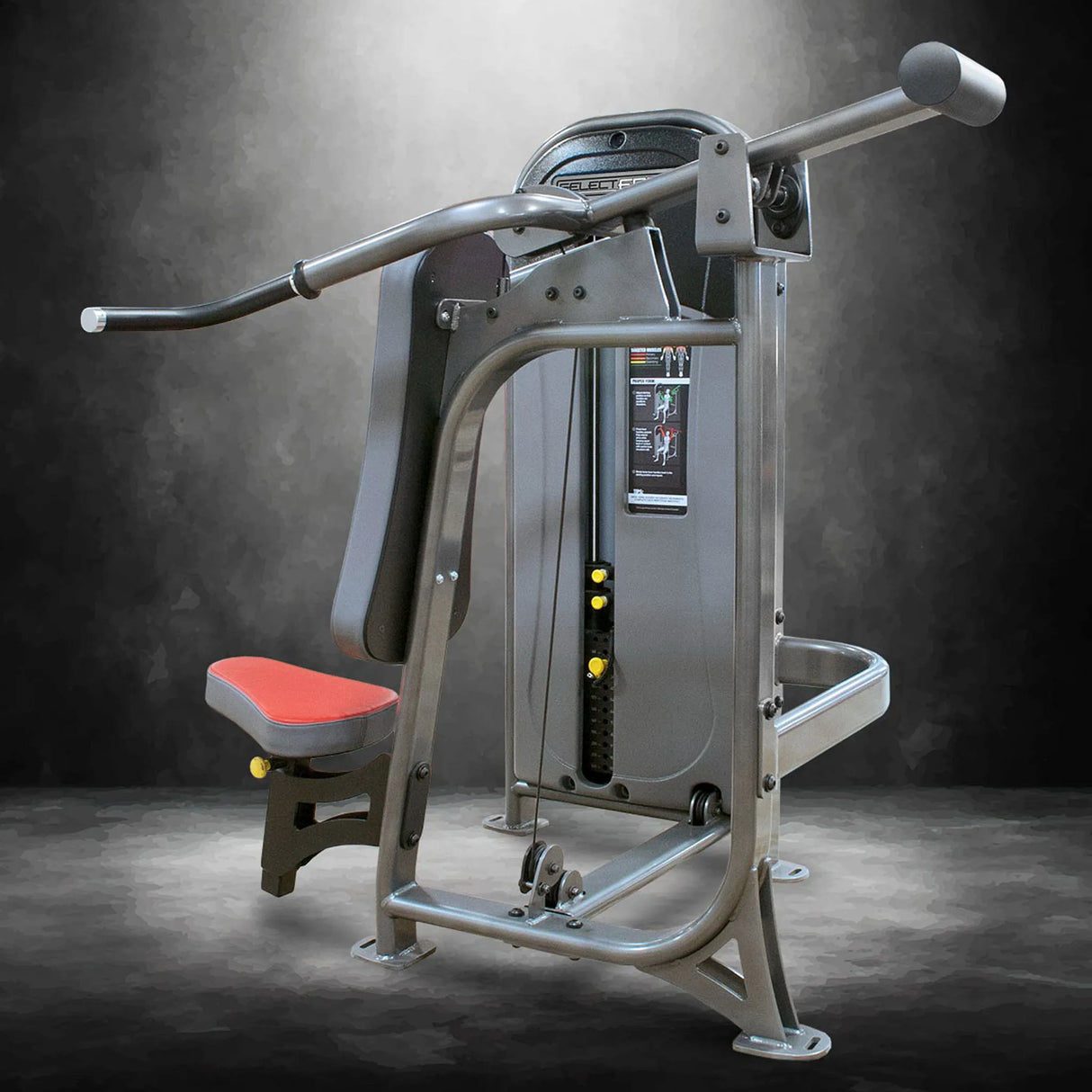 Gym machine with red seat on a dark background